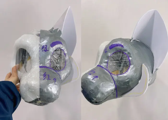 Duct tape head base marked up during a fursuit head commission build